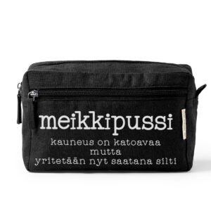 Musta meikkipussi tekstillä "kauneus on katoavaa mutta yritetään nyt saatana silti". Painettu Paskakaupalla Porvoossa