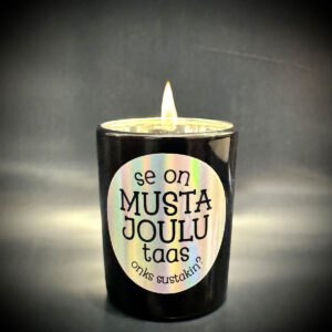 Musta kynttilä, jossa teksti "se on musta joulu taas onks sustakin"